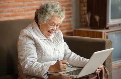 elderly lady using a laptop
